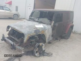 2008 Jeep Wrangler Unlimited Sahara z VIN 1J4GA59188L595981, wystawiony jako IAAI lot #42428134 z przebiegiem Nie podano mil oraz . Historia ofert i sprzedaży dostępna na DreamBid. Obrazek 2.