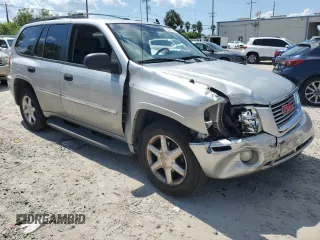 2007 GMC Envoy SLT with VIN 1GKDS13SX72163482, listed as a Copart auction lot 72439864 with 218,719 mi miles and Salvage Title. Bid and sale history available at carsss.com. Image 4.
