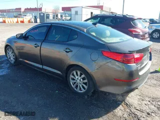 2014 Kia Optima EX with VIN 5XXGN4A72EG275751, listed as a IAAI auction lot 41807589 with 197,461 mi miles. Bid and sale history available at carsss.com. Image 3.