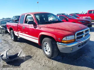 2004 Dodge Dakota SLT with VIN 1D7GL42N24S589414, listed as a IAAI auction lot 41219286 with 145,851 mi miles. Bid and sale history available at carsss.com. Image 1.