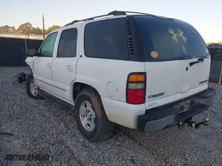 2005 Chevrolet Tahoe LT with VIN 1GNEC13T05J219574, listed as a IAAI auction lot 41828368 with 208,408 mi miles. Bid and sale history available at carsss.com. Image 3.