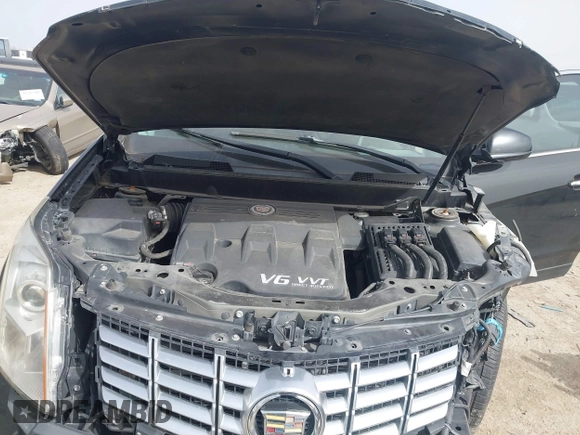 2013 Cadillac SRX z VIN 3GYFNAE3XDS654498, wystawiony jako IAAI lot #41740938 z przebiegiem 134 933 mil mil oraz . Historia ofert i sprzedaży dostępna na DreamBid. Obrazek 10.