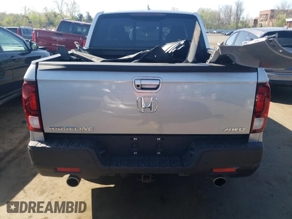 2023 Honda Ridgeline RTL-E with VIN 5FPYK3F77PB059763, listed as a Copart auction lot 54026045 with 34,114 mi miles and Salvage title. Bid and sale history available at DreamBid. Image 6.