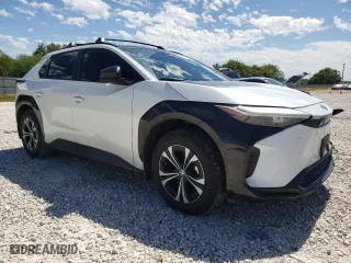 2024 Toyota bZ4X XLE with VIN JTMAAAAA1RA034325, listed as a Copart auction lot 70812224 with 10,164 mi miles and Salvage Title. Bid and sale history available at carsss.com. Image 4.