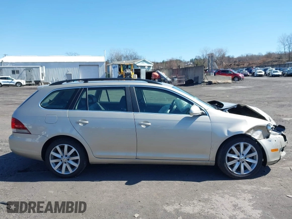 2014 Volkswagen Jetta SportWagen TDI with VIN 3VWPL7AJ8EM610672, listed as a IAAI auction lot 41811091 with 129,554 mi miles. Bid and sale history available at carsss.com. Image 13.