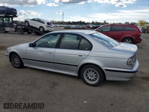 2000 BMW 5 Series 528iA with VIN WBADM6346YGU10549, listed as a Copart auction lot 75047164 with 324,945 mi miles and Salvage Title. Bid and sale history available at carsss.com. Image 2.