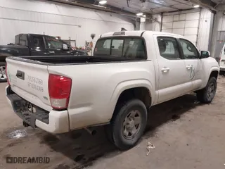 2016 Toyota Tacoma SR with VIN 3TMCZ5AN6GM030220, listed as a IAAI auction lot 41595427 with 174,296 mi miles. Bid and sale history available at carsss.com. Image 4.