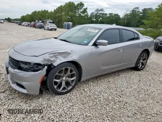 2015 Dodge Charger SXT z VIN 2C3CDXHG1FH725269, wystawiony jako Copart lot #58314235 z przebiegiem 234 386 mil mil oraz Szkoda całkowita • Salvage title. Historia ofert i sprzedaży dostępna na DreamBid. Obrazek 1.