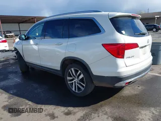 2017 Honda Pilot Elite with VIN 5FNYF6H06HB041609, listed as a IAAI auction lot 41804477 with 134,535 mi miles and . Bid and sale history available at DreamBid. Image 3.