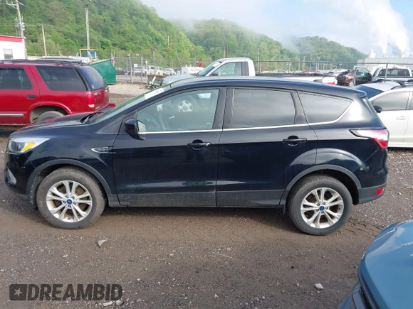 2017 Ford Escape SE with VIN 1FMCU9GD0HUC62616, listed as a IAAI auction lot 42194561 with 97,897 mi miles and . Bid and sale history available at DreamBid. Image 14.