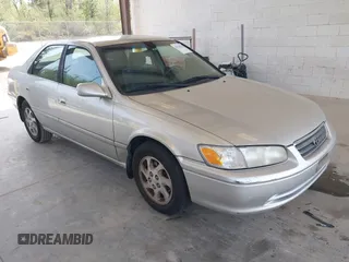 2000 Toyota Camry LE z VIN JT2BF22K2Y0239961, wystawiony jako IAAI lot #42128226 z przebiegiem 154 691 mil mil oraz . Historia ofert i sprzedaży dostępna na DreamBid. Obrazek 1.