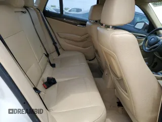 2014 BMW X1 xDrive28i z VIN WBAVL1C56EVY10542, wystawiony jako Copart lot #53116555 z przebiegiem 109 473 mil mil oraz Czysty tytuł • Clean title. Historia ofert i sprzedaży dostępna na DreamBid. Obrazek 10.