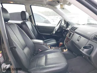 2000 Mercedes-Benz M-Class with VIN 4JGAB72E9YA208069, listed as a IAAI auction lot 41530528 with 155,967 mi miles. Bid and sale history available at carsss.com. Image 5.