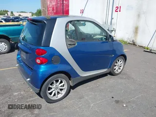 2009 Smart fortwo Pure with VIN WMEEJ31X19K243304, listed as a IAAI auction lot 42860139 with 119,617 mi miles and . Bid and sale history available at DreamBid. Image 4.