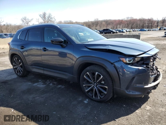 2023 Mazda CX-50 Premium Plus with VIN 7MMVABEY1PN125180, listed as a Copart auction lot 52075375 with 32,483 mi miles and Salvage Title. Bid and sale history available at DreamBid. Image 4.