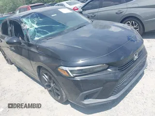 2023 Honda Civic Sport with VIN 2HGFE2F5XPH529344, listed as a IAAI auction lot 42446154 with 52,660 mi miles and . Bid and sale history available at DreamBid. Image 1.
