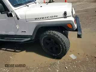 2003 Jeep Wrangler Rubicon z VIN 1J4FA69S73P333199, wystawiony jako Copart lot #50602615 z przebiegiem 133 254 mil mil oraz Szkoda całkowita • Salvage title. Historia ofert i sprzedaży dostępna na DreamBid. Obrazek 10.