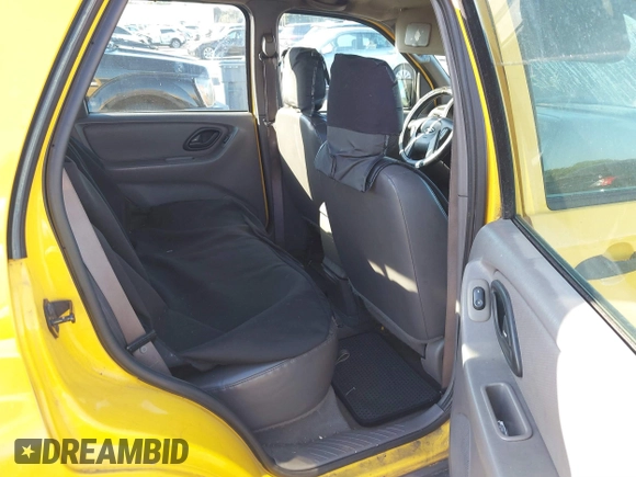 2002 Ford Escape XLS Choice with VIN 1FMYU01132KD56671, listed as a IAAI auction lot 41552541 with 245,923 mi miles and . Bid and sale history available at DreamBid. Image 8.