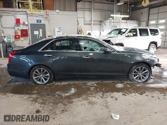 2017 Cadillac CTS Luxury AWD with VIN 1G6AX5SS5H0175404, listed as a IAAI auction lot 41584754 with 231,354 mi miles and . Bid and sale history available at DreamBid. Image 13.