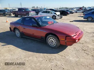 1989 Nissan 240SX z VIN RS13604765, wystawiony jako Copart lot #46514985 z przebiegiem 115 929 mil mil oraz Szkody całkowita. Historia ofert i sprzedaży dostępna na DreamBid. Obrazek 4.