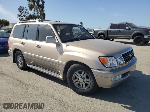 2001 Lexus LX 470 z VIN JTJHT00W213507042, wystawiony jako Copart lot #52634195 z przebiegiem 179 707 mil mil oraz Tytuł czysty. Historia ofert i sprzedaży dostępna na DreamBid. Obrazek 4.