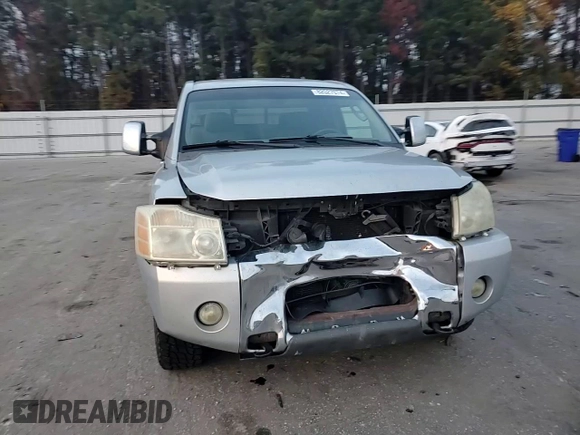 2005 Nissan Titan SE with VIN 1N6BA06B45N539629, listed as a Copart auction lot 82527074 with 154,255 mi miles and Salvage title. Bid and sale history available at DreamBid. Image 11.