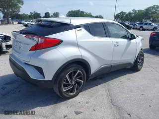 2022 Toyota C-HR XLE with VIN NMTKHMBX8NR147317, listed as a IAAI auction lot 41969293 with 11,621 mi miles. Bid and sale history available at carsss.com. Image 4.