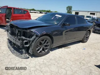2019 Dodge Charger SXT with VIN 2C3CDXBG5KH599467, listed as a Copart auction lot 61818325 with 148,061 mi miles and Salvage title. Bid and sale history available at DreamBid. Image 1.