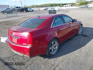 2008 Cadillac CTS RWD w/1SB with VIN 1G6DR57V580212574, listed as a IAAI auction lot 42010537 with 122,390 mi miles. Bid and sale history available at carsss.com. Image 4.