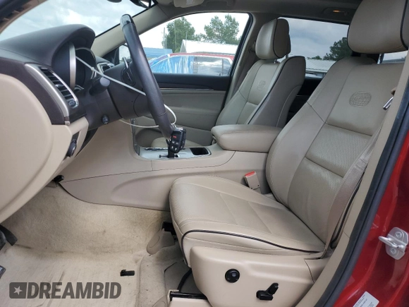 2015 Jeep Grand Cherokee Overland with VIN 1C4RJECG2FC823353, listed as a Copart auction lot 58367395 with 72,117 mi miles and Salvage title. Bid and sale history available at DreamBid. Image 7.