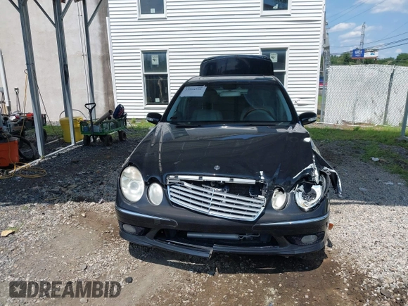 2005 Mercedes-Benz E-Class 3.2L with VIN WDBUF65J05A634879, listed as a IAAI auction lot 39904592 with 4,835 mi miles. Bid and sale history available at carsss.com. Image 12.