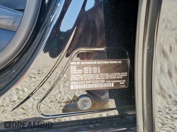 2015 BMW 5 Series 528i with VIN WBA5A5C59FD520199, listed as a Copart auction lot 59214725 with 116,914 mi miles and Salvage title. Bid and sale history available at DreamBid. Image 12.