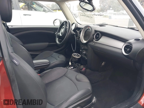 2011 MINI Hardtop with VIN WMWSU3C50BT094756, listed as a IAAI auction lot 42403084 with 52,701 mi miles and . Bid and sale history available at DreamBid. Image 5.