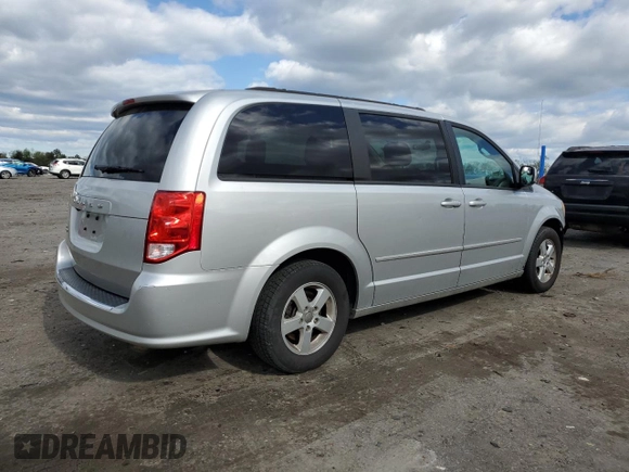 2012 Dodge Grand Caravan SXT with VIN 2C4RDGCG5CR327937, listed as a Copart auction lot 52905955 with 168,382 mi miles and Salvage Title. Bid and sale history available at DreamBid. Image 3.