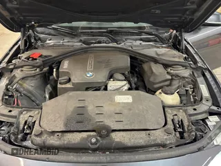 2014 BMW 4 Series 428i xDrive with VIN WBA3N5C56EF716258, listed as a Copart auction lot 52916185 with 106,512 mi miles and Salvage Title. Bid and sale history available at DreamBid. Image 7.