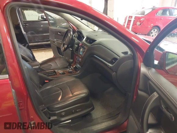 2013 Chevrolet Traverse LT with VIN 1GNKVJKDXDJ185830, listed as a IAAI auction lot 42142542 with 218,069 mi miles and . Bid and sale history available at DreamBid. Image 5.