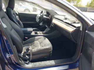 2020 Tesla Model 3 Standard Range Plus z VIN 5YJ3E1EA2LF739866, wystawiony jako IAAI lot #41842179 z przebiegiem 70 089 mil mil oraz . Historia ofert i sprzedaży dostępna na DreamBid. Obrazek 5.