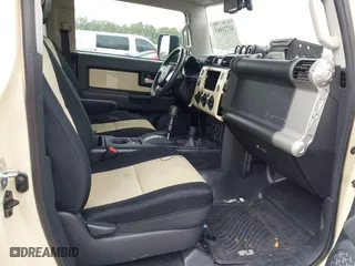 2010 Toyota FJ Cruiser with VIN JTEBU4BF1AK095319, listed as a IAAI auction lot 41721065 with 126,262 mi miles. Bid and sale history available at carsss.com. Image 5.