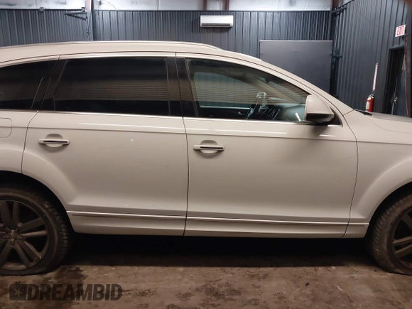 2013 Audi Q7 Premium Plus with VIN WA1LGAFE1DD009705, listed as a IAAI auction lot 41390712 with 99,649 mi miles and . Bid and sale history available at DreamBid. Image 13.