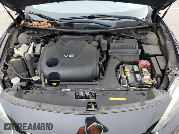 2016 Nissan Maxima SV z VIN 1N4AA6AP0GC397126, wystawiony jako Copart lot #56601695 z przebiegiem 103 990 mil mil oraz Szkoda całkowita • Salvage title. Historia ofert i sprzedaży dostępna na DreamBid. Obrazek 11.