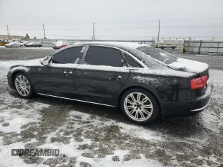 2014 Audi A8 L 3.0T with VIN WAURGAFD1EN002981, listed as a Copart auction lot 87282884 with 106,763 mi miles and Salvage Title. Bid and sale history available at carsss.com. Image 2.