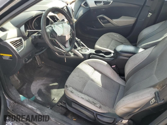2013 Hyundai Veloster w/Gray Int z VIN KMHTC6AD1DU101406, wystawiony jako Copart lot #55087095 z przebiegiem 115 373 mil mil oraz Szkoda całkowita • Salvage title. Historia ofert i sprzedaży dostępna na DreamBid. Obrazek 7.