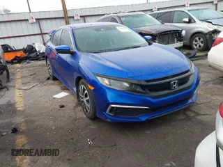2020 Honda Civic LX z VIN 2HGFC2F6XLH593523, wystawiony jako IAAI lot #41802608 z przebiegiem 82 205 mil mil oraz . Historia ofert i sprzedaży dostępna na DreamBid. Obrazek 1.
