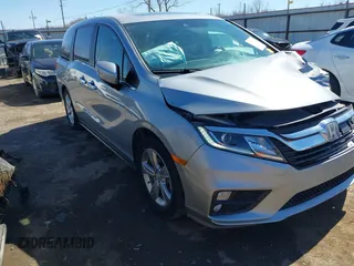 2018 Honda Odyssey EX-L with VIN 5FNRL6H71JB077112, listed as a IAAI auction lot 41721523 with 70,893 mi miles. Bid and sale history available at carsss.com. Image 1.