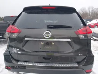 2017 Nissan Rogue SL with VIN 5N1AT2MT0HC813372, listed as a IAAI auction lot 41215661 with 109,101 mi miles and . Bid and sale history available at DreamBid. Image 16.