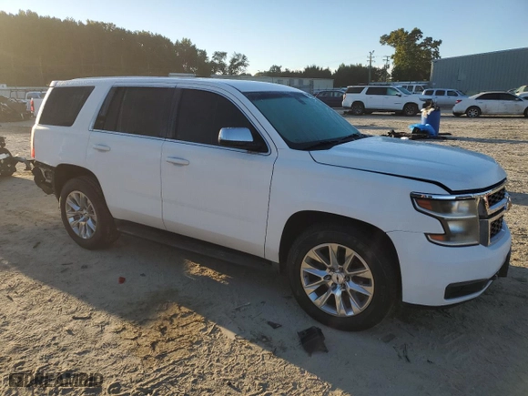 2015 Chevrolet Tahoe Commercial with VIN 1GNSK2ECXFR695889, listed as a Copart auction lot 74369994 with 196,209 mi miles and Salvage Title. Bid and sale history available at carsss.com. Image 4.