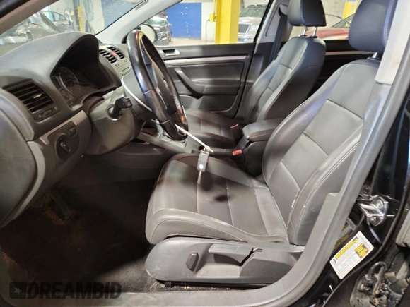 2009 Volkswagen Jetta SE with VIN 3VWRZ71K09M166838, listed as a Copart auction lot 62273635 with 156,816 mi miles and Salvage title. Bid and sale history available at DreamBid. Image 7.
