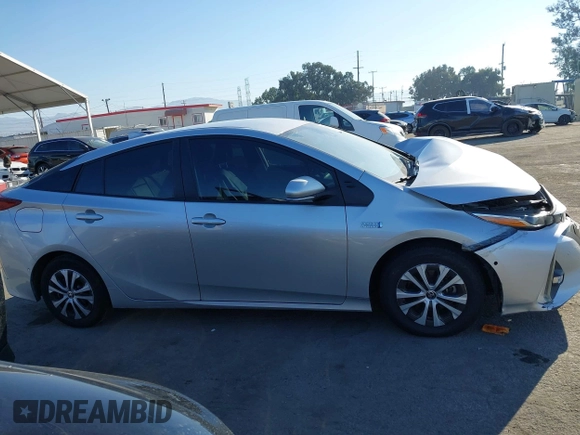 2022 Toyota Prius LE with VIN JTDKAMFP3N3209448, listed as a IAAI auction lot 40533784 with 116,436 mi miles and . Bid and sale history available at DreamBid. Image 13.