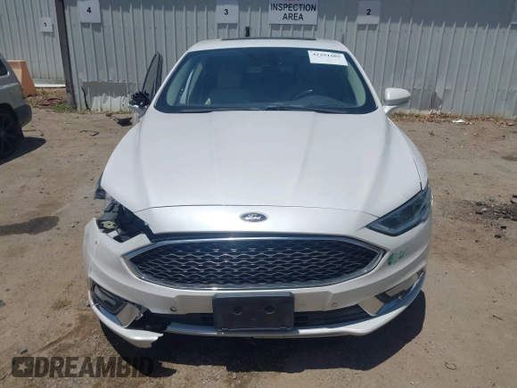 2017 Ford Fusion Titanium z VIN 3FA6P0SU0HR329224, wystawiony jako IAAI lot #42291605 z przebiegiem 176 728 mil mil oraz . Historia ofert i sprzedaży dostępna na DreamBid. Obrazek 13.