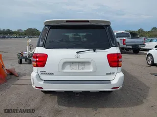 2004 Toyota Sequoia Limited with VIN 5TDZT38A04S236082, listed as a IAAI auction lot 41598592 with 104,042 mi miles. Bid and sale history available at carsss.com. Image 17.